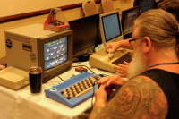 A die-hard's C64, customized, and kitted out for maximum Commodore goodness.  You can't see it, but that guy has a CBM logo tattooed on his other arm.